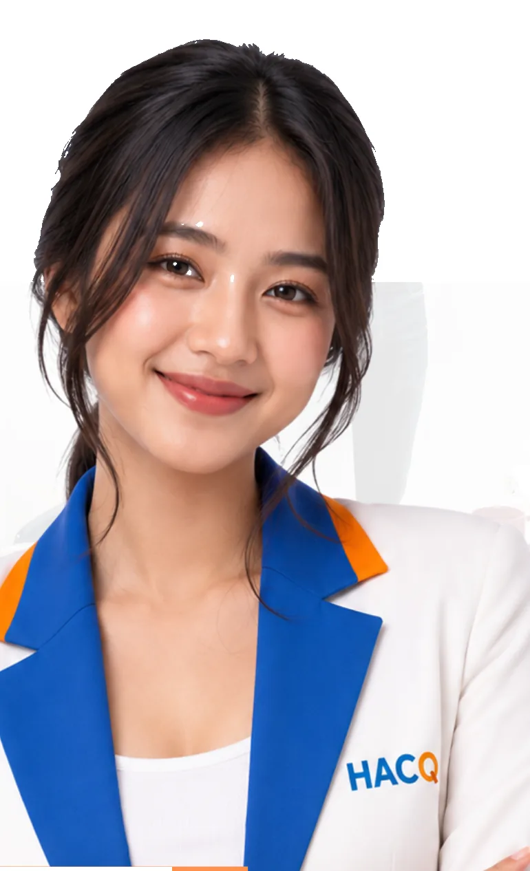A HACQ specialist in a HACQ-branded blazer, smiling
